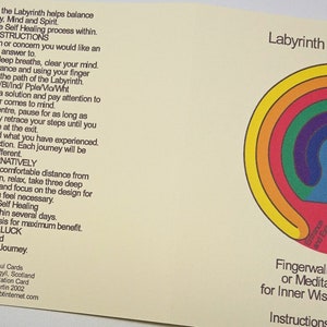 May include: A yellow card with instructions on how to use a labyrinth for meditation. The card features a colorful labyrinth design with a white center and a red heart symbol in the bottom left corner. The text on the card reads "Labyrinth Meditation Card" and "Fingerwalk the Labyrinth or Meditate on Design for Inner Wisdom and Healing".