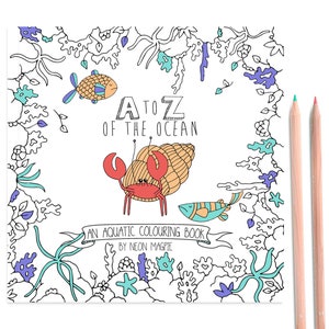 May include: A black and white coloring book with a title that reads "A to Z of the Ocean". The cover features a cartoon hermit crab, a fish, and seaweed. The text "An Aquatic Coloring Book by Neon Magpie" is also included.