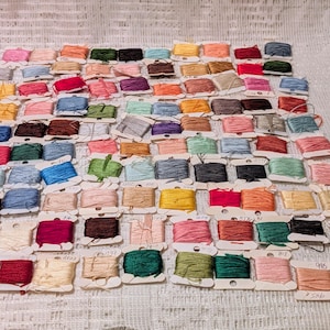 Embroidery threads, 221 threads on cardboard spools, various colors and thread amounts