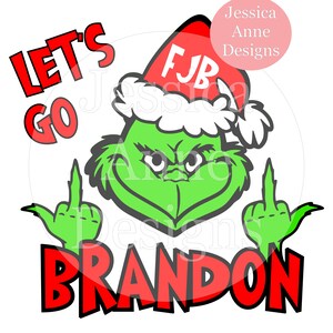 May include: Green Grinch character wearing a red Santa hat with the letters "FJB" on it. The Grinch is giving the middle finger with both hands. The text "Let's Go Brandon" is written in red letters below the Grinch.