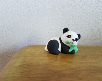 Ceramic Small Panda Bear Laying down eating Bamboo Leaves (#1106)