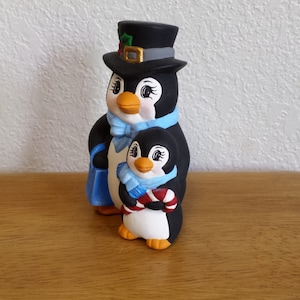 Ceramic Penguin with Top Hat and small Penguin with candy Cane (#41)