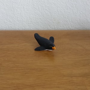Ceramic Tiny Penguin on Belly (#610)