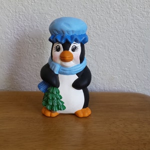 Ceramic Penguin- Mama Penguin with Bonnet holding tree(#40)