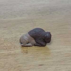 Ceramic tiny Buffalo laying Down (#325B)