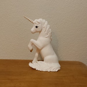 Unicorn Sitting - Has a little glitter on tail and mane to create the mystical effect.(#467)
