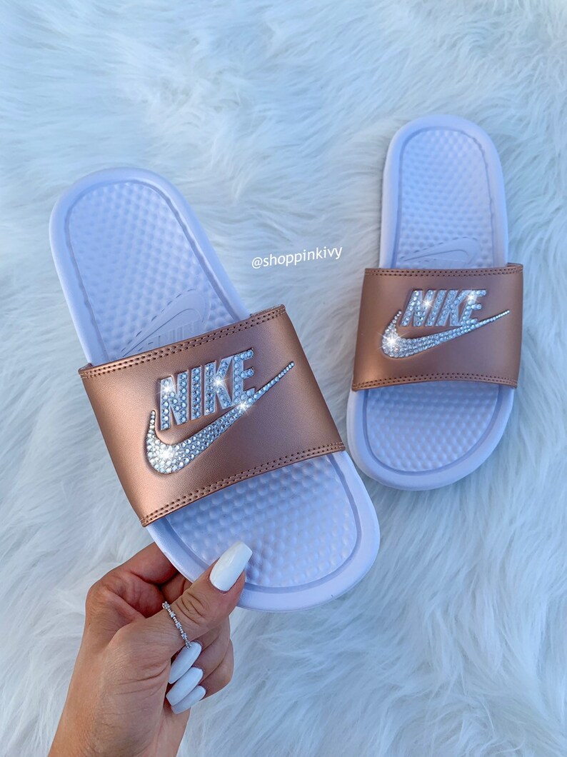 blue and gold nike slides