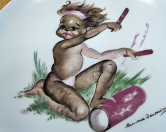 Brownie Downing 20cm original Aboriginal plate painting boy child playing drum Australian artist Vintage collectable