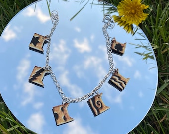 Pulsera, collar o AMBOS de clan inspirados en el gato guerrero.