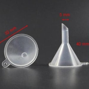 May include: Two clear plastic funnels, one with a 5 mm spout and a 40 mm diameter, and the other with a 32 mm diameter.