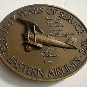 Vintage Eastern Airlines employee 50yrs service Bronze medallion paperweight 1978 made of airplane & Apollo 8 metals!