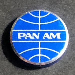 One tiny Vintage Pan Am Airlines Globe Logo Metal “freeze Caps” ??  Blue/Silver
