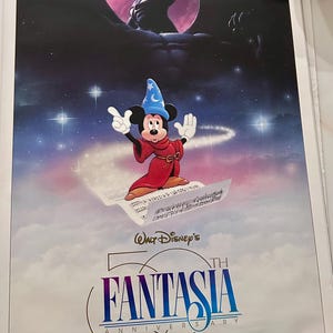 May include: A vintage poster celebrating the 50th anniversary of Walt Disney's Fantasia. The poster features Mickey Mouse as the Sorcerer's Apprentice, with a dark silhouette of the Devil in the background. The text on the poster reads "Walt Disney's 50th Fantasia Anniversary".