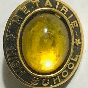 ヴィンテージ 60 年代 クラスリング METAIRIE 高校ペンダントピン アンバー 誕生石
