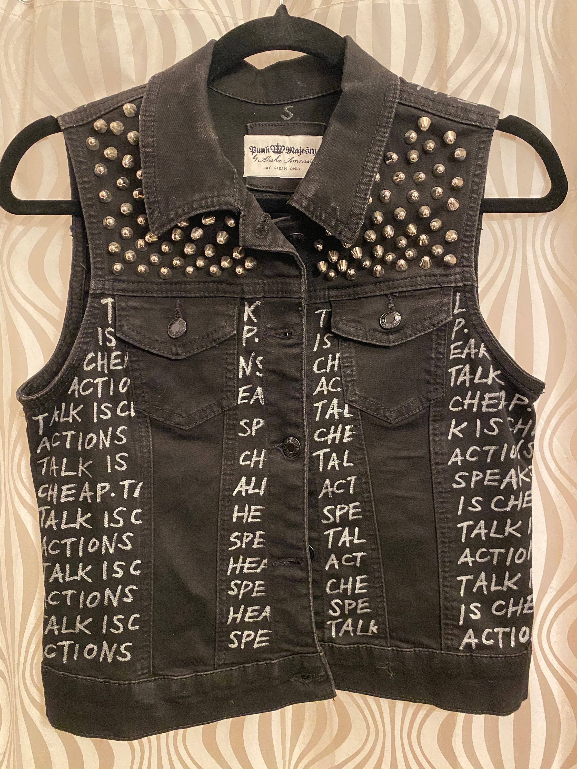 Studded Punk Vest: Talk is Cheap, Actions Speak. Black Denim Studded Punk Vest: Talk is Cheap, Actions Speak. Black Denim