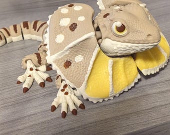 Lézard articulé à col jabot imprimé en 3D