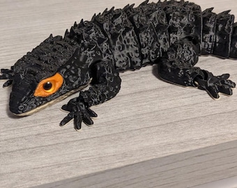 3d printed articulated red eyed skink