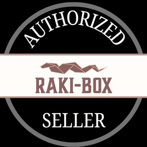 May include: A black and white graphic with the words "AUTHORIZED SELLER" in white, encircling a rectangular banner. The banner contains the text "RAKI-BOX" in brown, with a brown origami-style design above it.