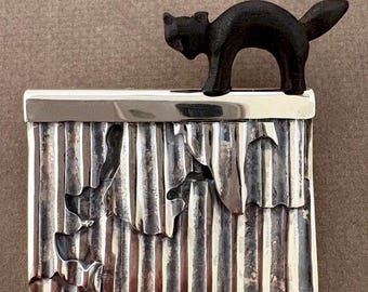 La gata sobre el tejado de zinc - Broche