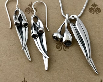 SET- pendientes grandes/ colgante de nuez de goma y hoja en caja