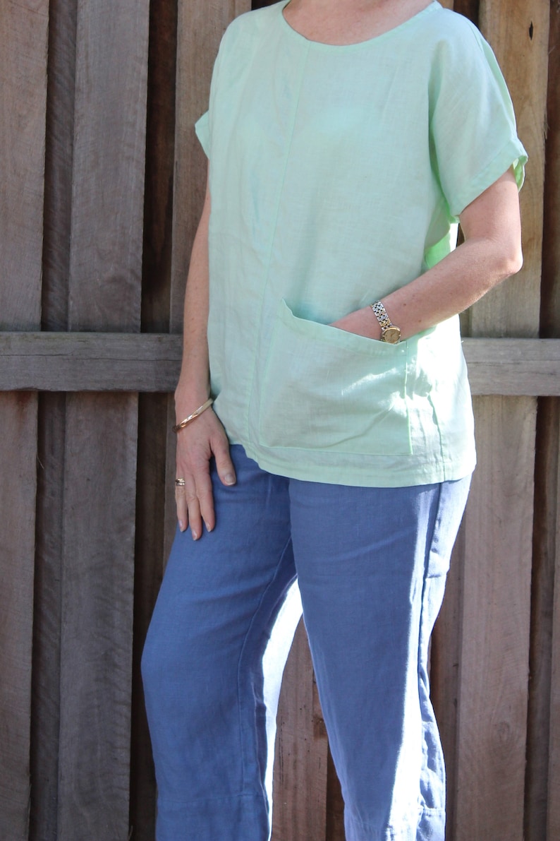 Womens wide shoulder 100/% Linen tee with angled patch pocket Light Green