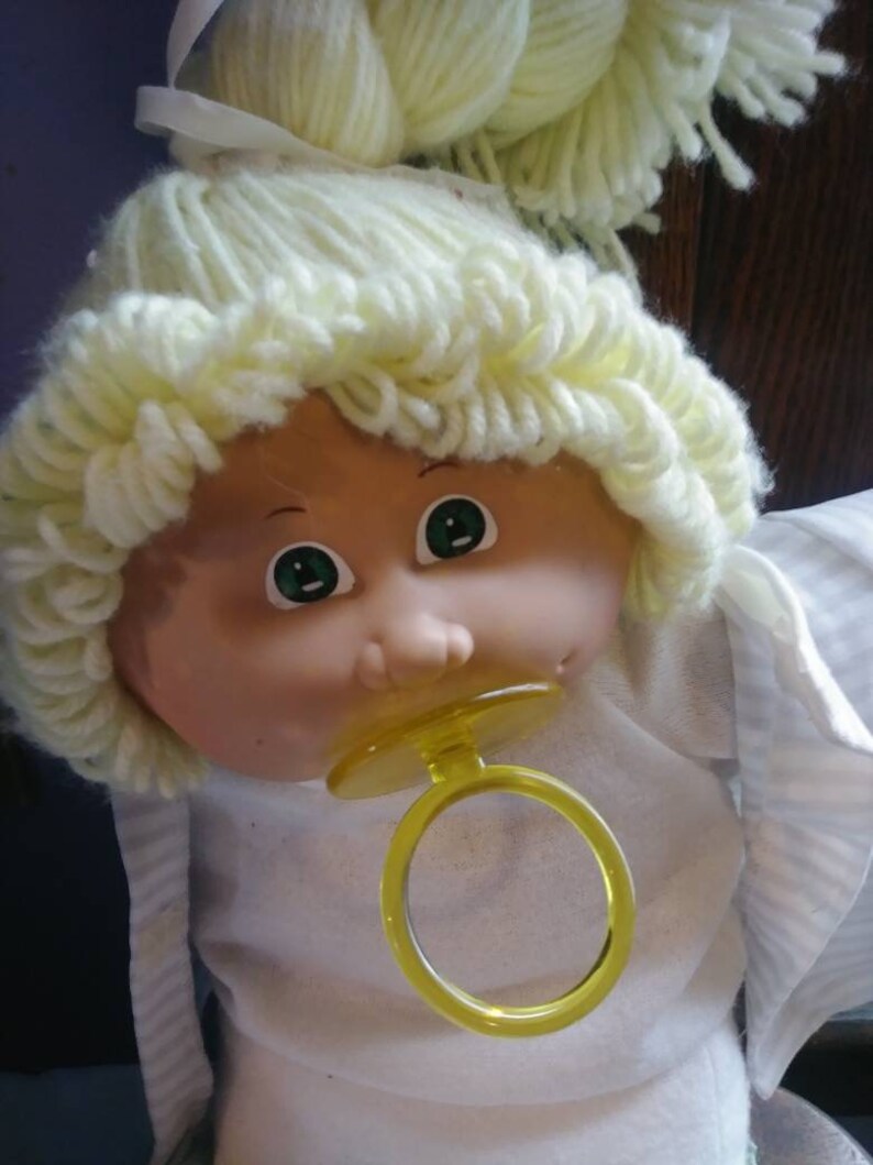 Yellow Hair Cabbage Doll with Green Eyes with Pacifer