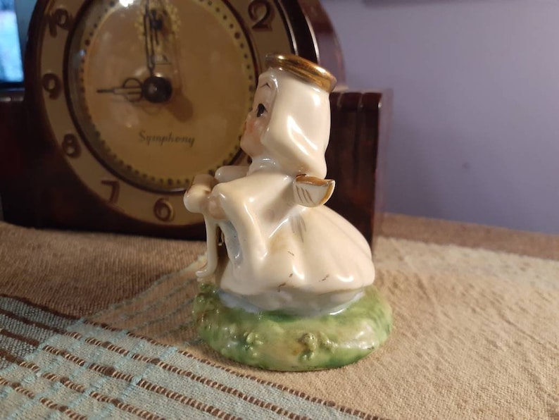 Free Shipping USA Vintage Choir Angel Singing and Holding Music Standing in Green Grass and Flowers