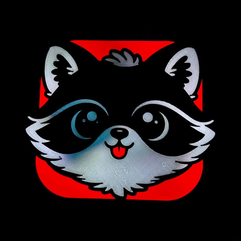 May include: A cartoon raccoon face with large eyes, a silver snout, and a red tongue, set against a red square on a black background. The raccoon has black fur and silver accents, creating a playful and friendly design.