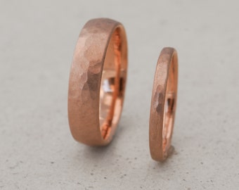 Wedding rings 333 red gold, finely hammered matt