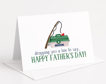 May include: A white Father's Day greeting card with a fishing theme. The card features a fishing rod, tackle box, and bobber illustration. Text reads "dropping you a line to say... HAPPY FATHER'S DAY!" in green and blue.