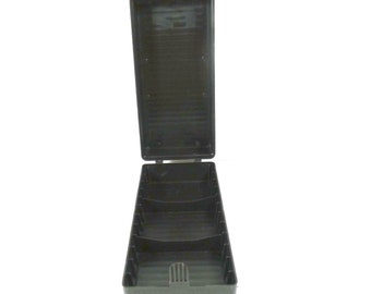 May include: Black plastic storage case with a handle and multiple compartments. The case is open and empty.