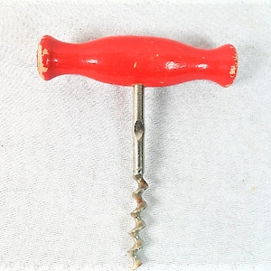 Vintage corkscrew, old retro corkscrew, antique wooden corkscrew