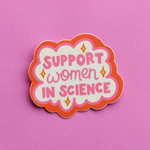 May include: Pink and orange sticker with a white cloud shape and the text "SUPPORT women IN SCIENCE".