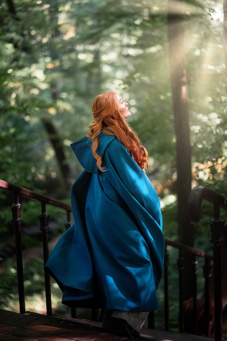 Blue-green hooded cape