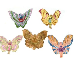 May include: Five embroidered patches featuring figures with butterfly wings. The top left patch is green and blue, the top right is yellow, the center is brown, the bottom left is pink and yellow, and the bottom right is blue and orange.