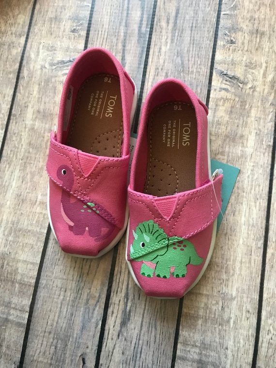 toms dinosaur slip ons