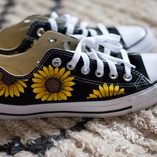 black converse with sunflowers