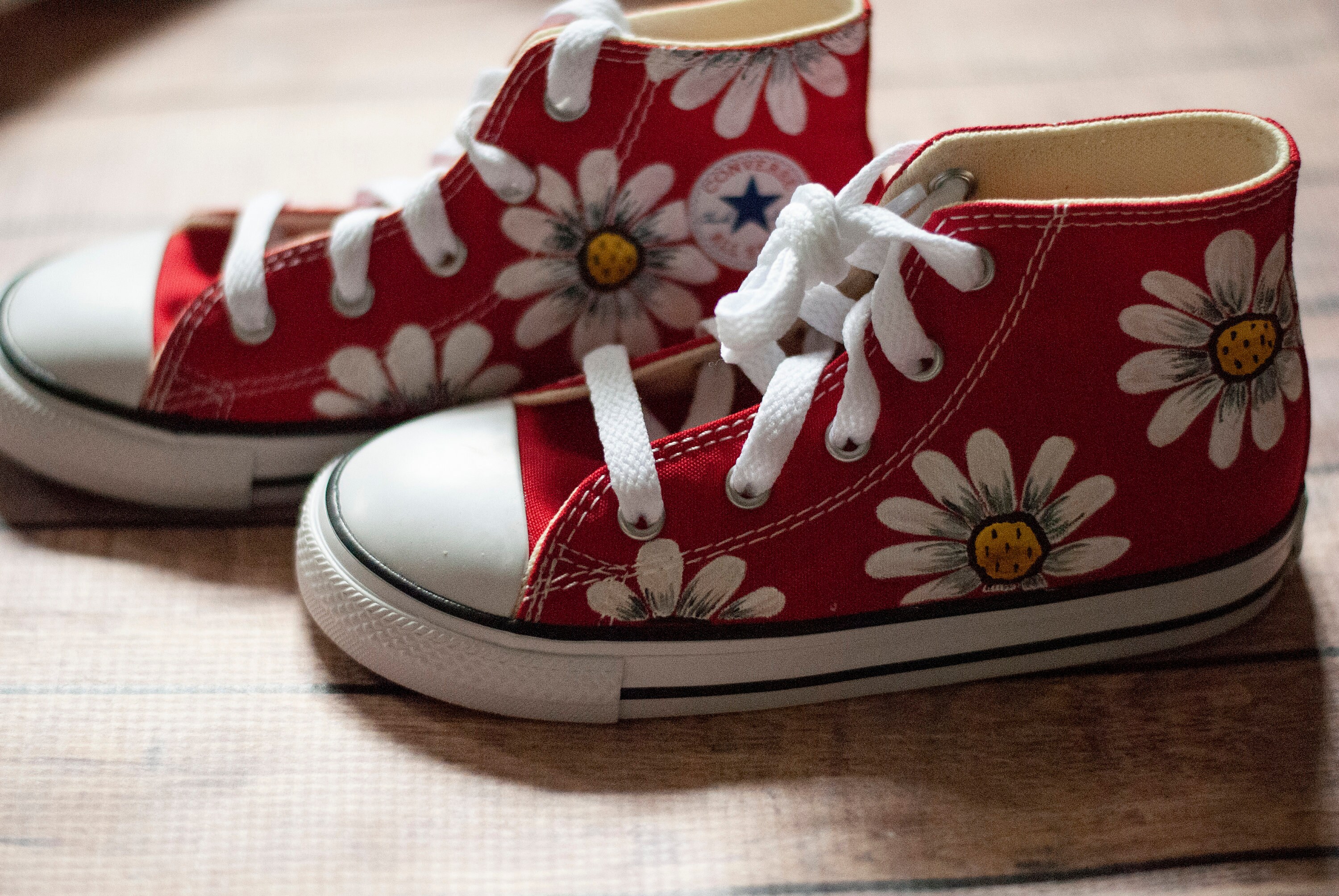 red daisy print converse