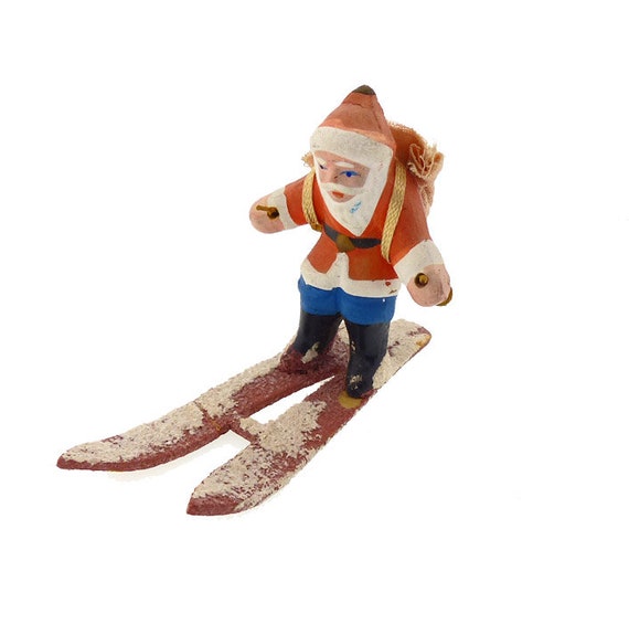 Antique Bisque Santa on Skis Christmas Decoration