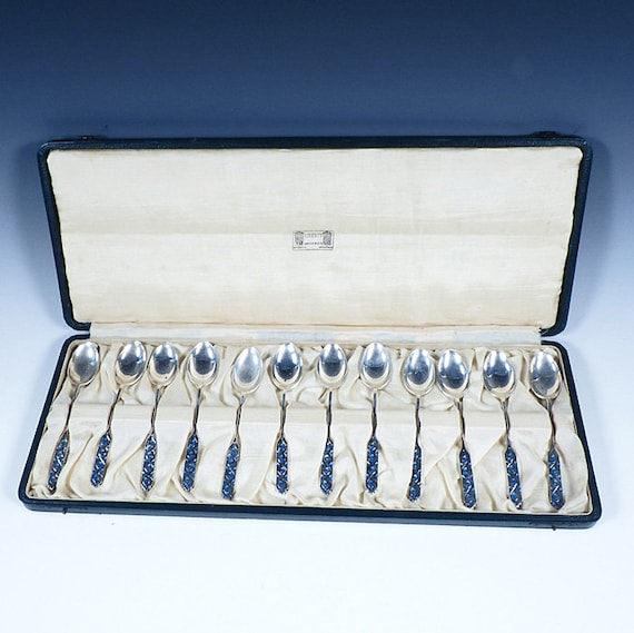 12 Liberty & Co. Archibald Knox Cymric Sterling Silver Enamel Spoons