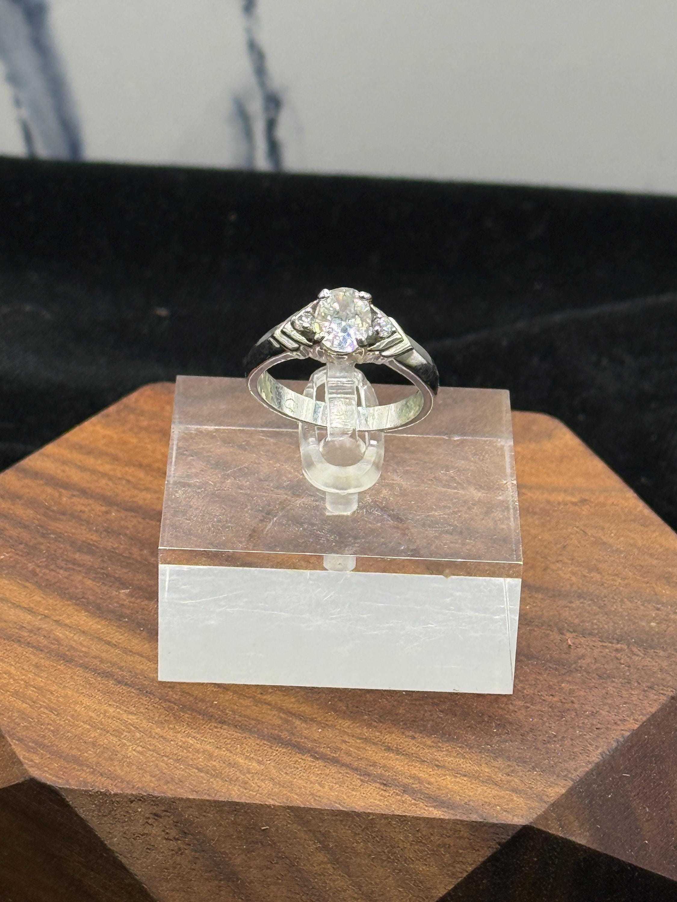 Oval Cut Diamond Ring: Silver Tone, Clear CZ, Size 8 - Etsy Silver Oval Cut Solitaire CZ Diamond Cocktail Ring Size 8 NWOT main image 0