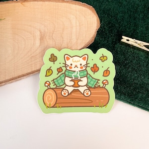 Gezellige kat - matte vinylsticker | Digitale Kunst, Stickers, grappig, Illustratie, kawaii, Briefpapier, schattig, gezellig, winter, dier, katten, bladeren