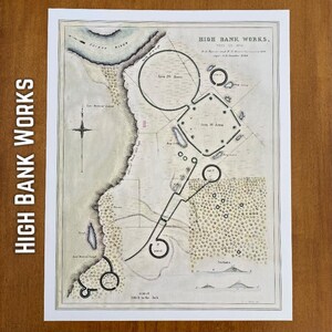 May include: An antique map print of High Bank Works, featuring detailed illustrations of the area's layout. The map includes text, circles, and geometric shapes, with a scale of 500 ft to the inch. The print has a vintage aesthetic with a cream-colored background.