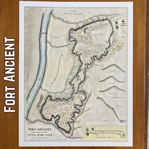 May include: An antique map of Fort Ancient, located on the East Bank of the Little Miami River. The map, with a scale of 525 feet to the inch, features detailed illustrations of the fort's layout, including the river, fortifications, and surrounding terrain. The text "FORT ANCIENT" is printed vertically on the left.