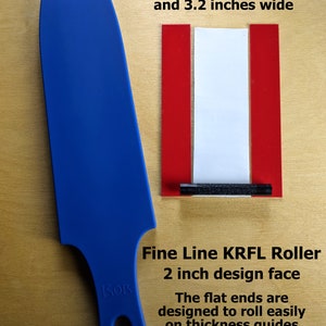 May include: Blue plastic roller tool with a 2 inch design face. The tool is 13.75 inches long and 3.2 inches wide. The text "Kor" is printed on the tool. The text "Fine Line KRFL Roller" is printed below the tool. The text "2 inch design face" is printed below the text "Fine Line KRFL Roller". The text "The flat ends are designed to roll easily on thickness guides" is printed below the text "2 inch design face". The text "Roller Board and thickness guides not included" is printed below the text "The flat ends are designed to roll easily on thickness guides".