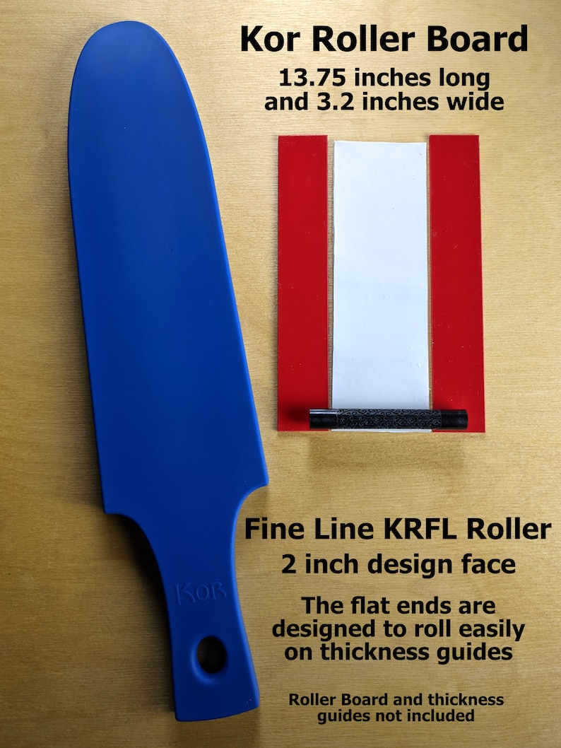 May include: Blue plastic roller tool with a 2 inch design face. The tool is 13.75 inches long and 3.2 inches wide. The text "Kor" is printed on the tool. The text "Fine Line KRFL Roller" is printed below the tool. The text "2 inch design face" is printed below the text "Fine Line KRFL Roller". The text "The flat ends are designed to roll easily on thickness guides" is printed below the text "2 inch design face". The text "Roller Board and thickness guides not included" is printed below the text "The flat ends are designed to roll easily on thickness guides".