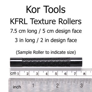 May include: A black textured roller for creating patterns on surfaces. The roller is 3 inches long and has a 2-inch design face. A ruler is shown for scale.
