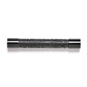 May include: A black metal rod with a textured surface. The rod has a geometric pattern.