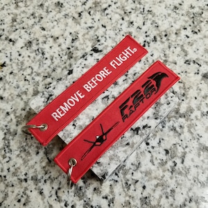 Amazon.com: Remove Before Flight DARK RED Key Chain Aviation