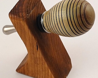 Handmade lime wooden bottle stopper with a tear drop metal attachment